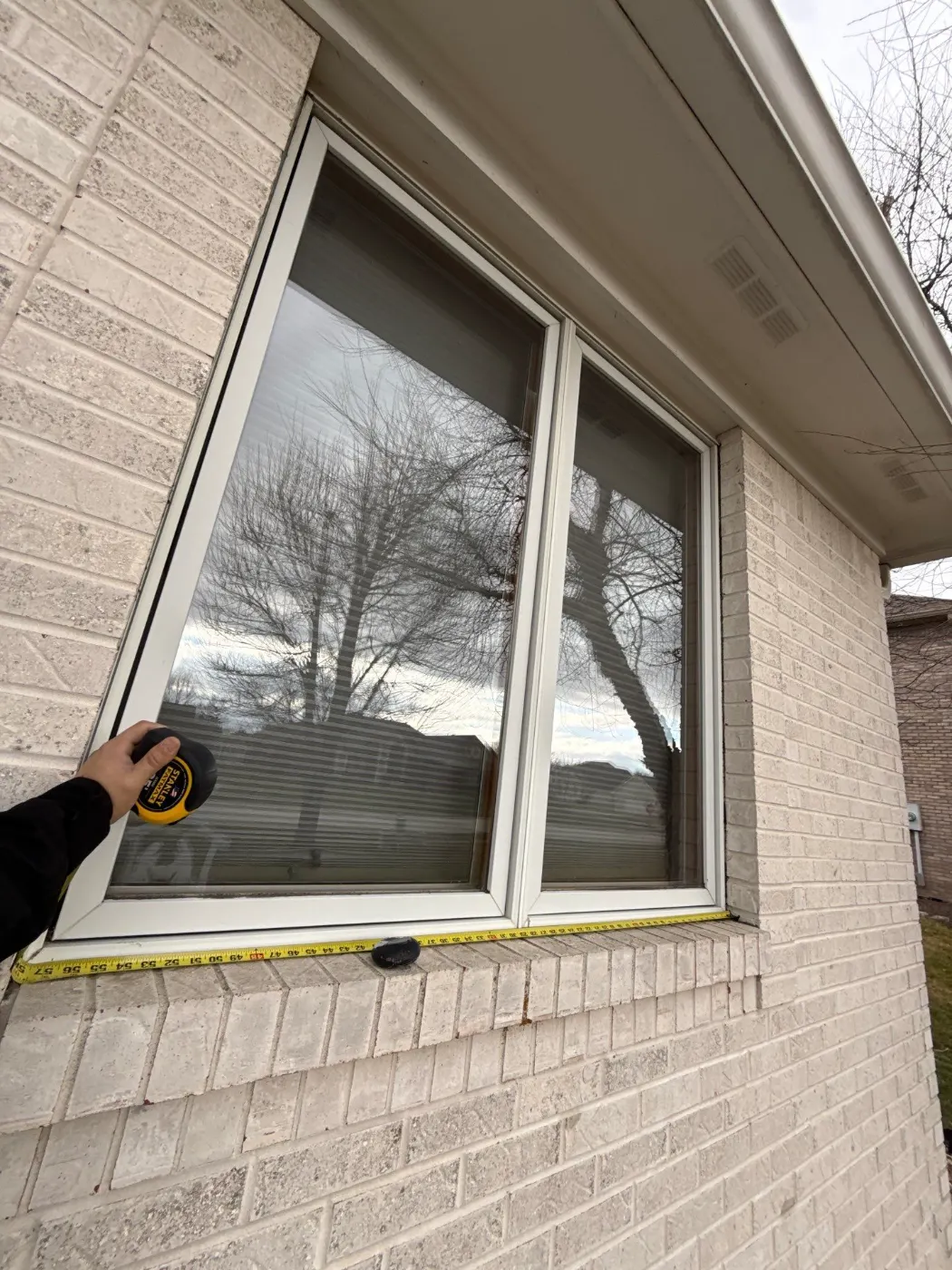 Window replacement documented in Chapel Pines